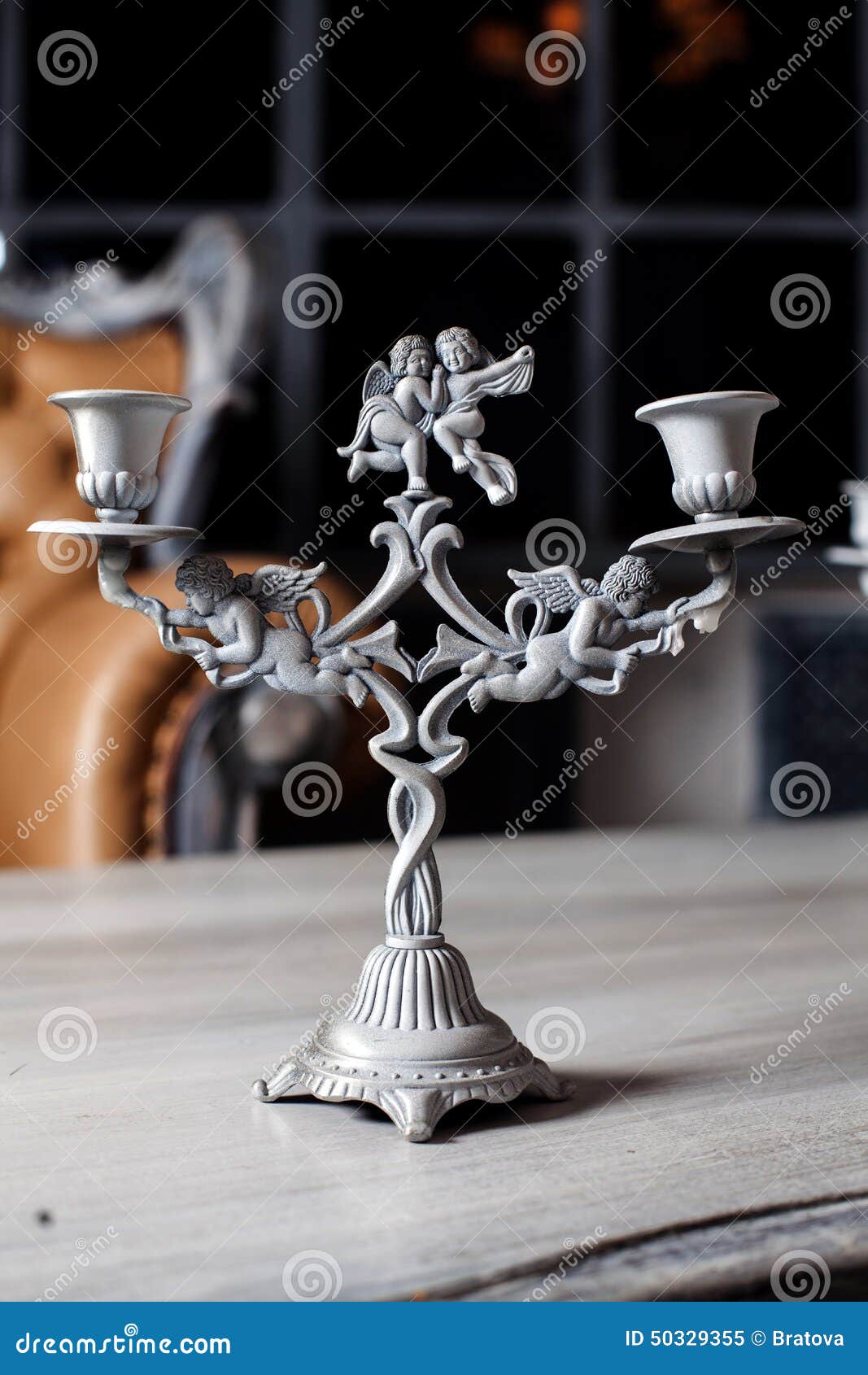 Beautiful Candlesticks with Angels Borokko on the Stock Image Image
