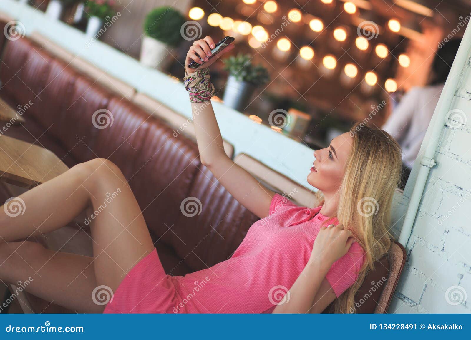 Blonde girl taking a selfie with her hair down - wide 8