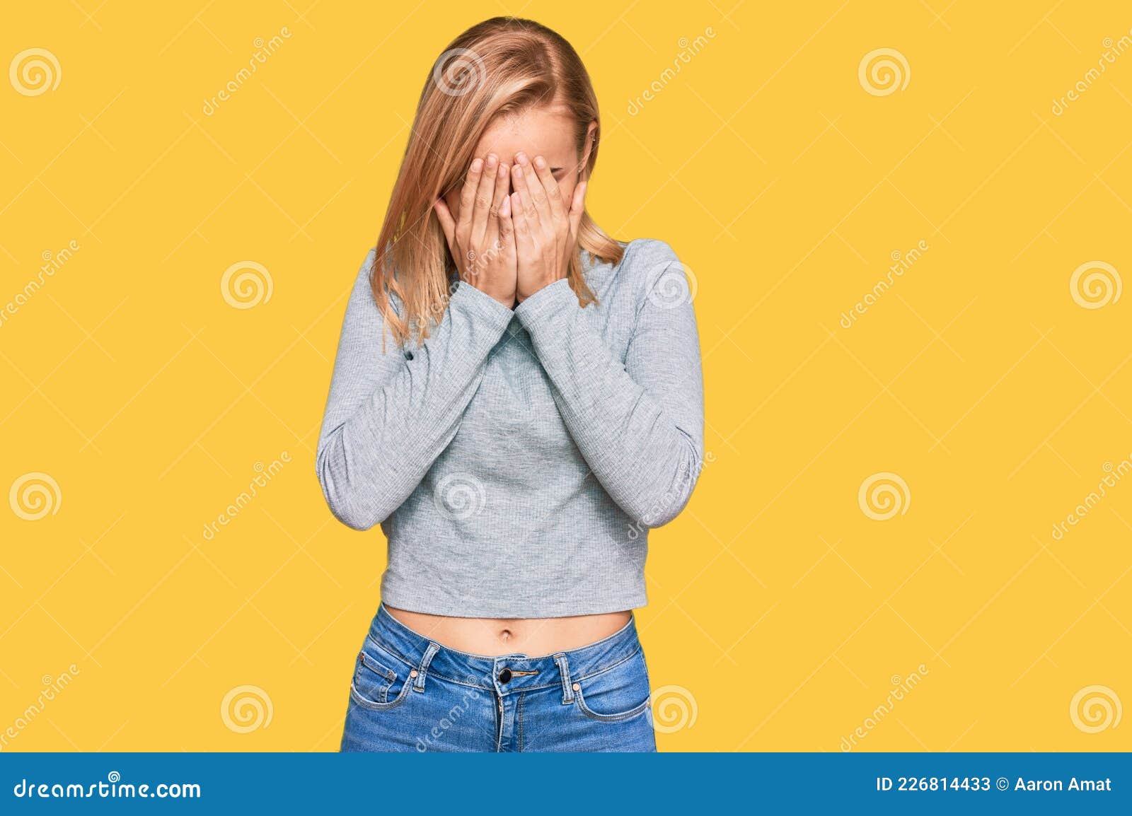 Beautiful Caucasian Woman Wearing Casual Clothes With Sad Expression Covering Face With Hands