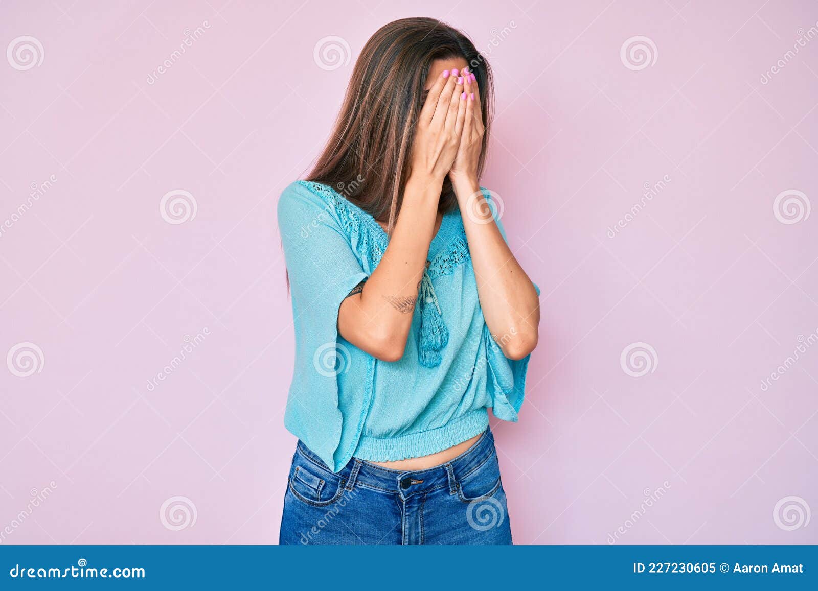 Beautiful Caucasian Woman Wearing Casual Clothes With Sad Expression Covering Face With Hands