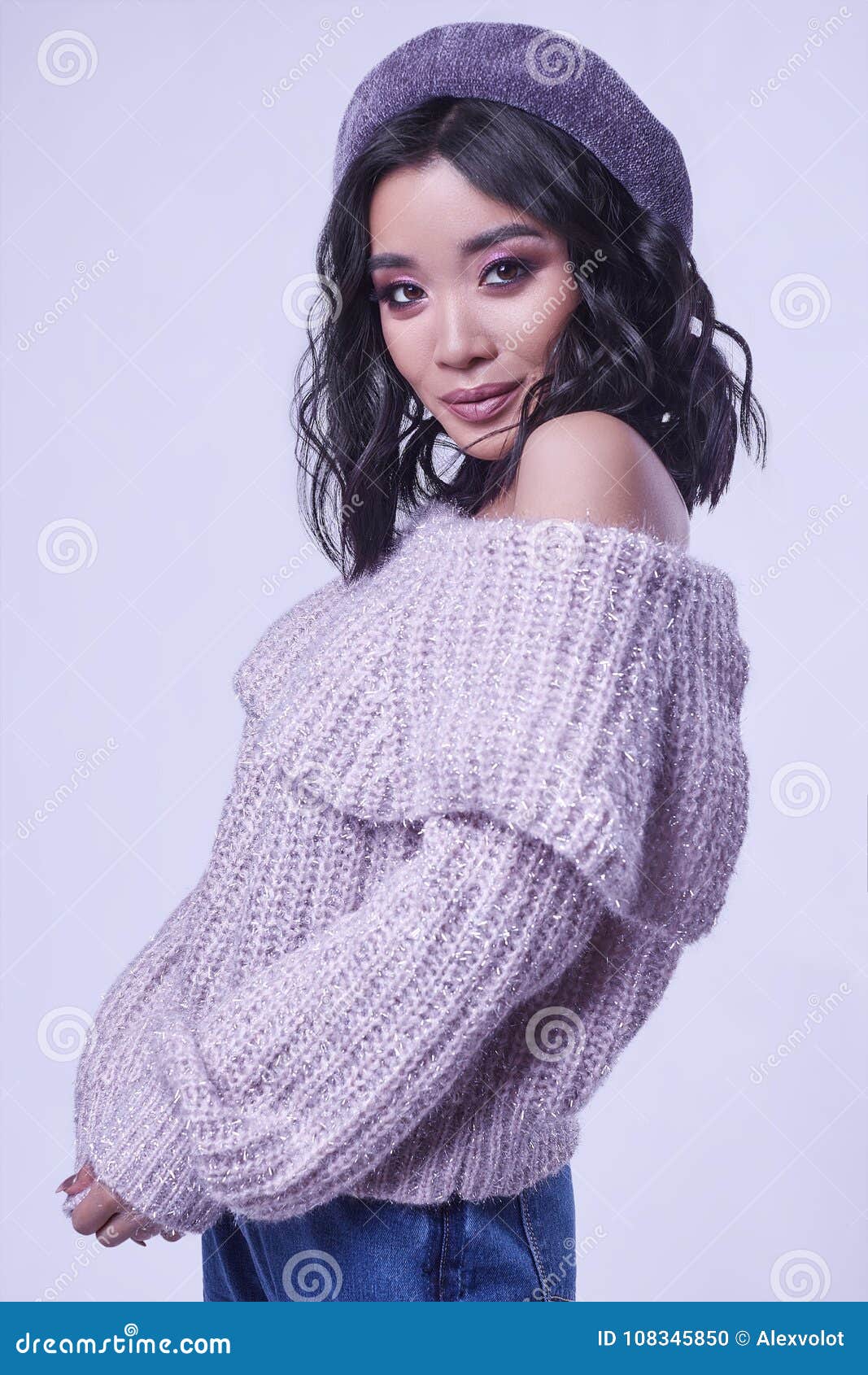 beautiful charming asian girl purple sweater bright background glamorous fashion portrait studio 108345850