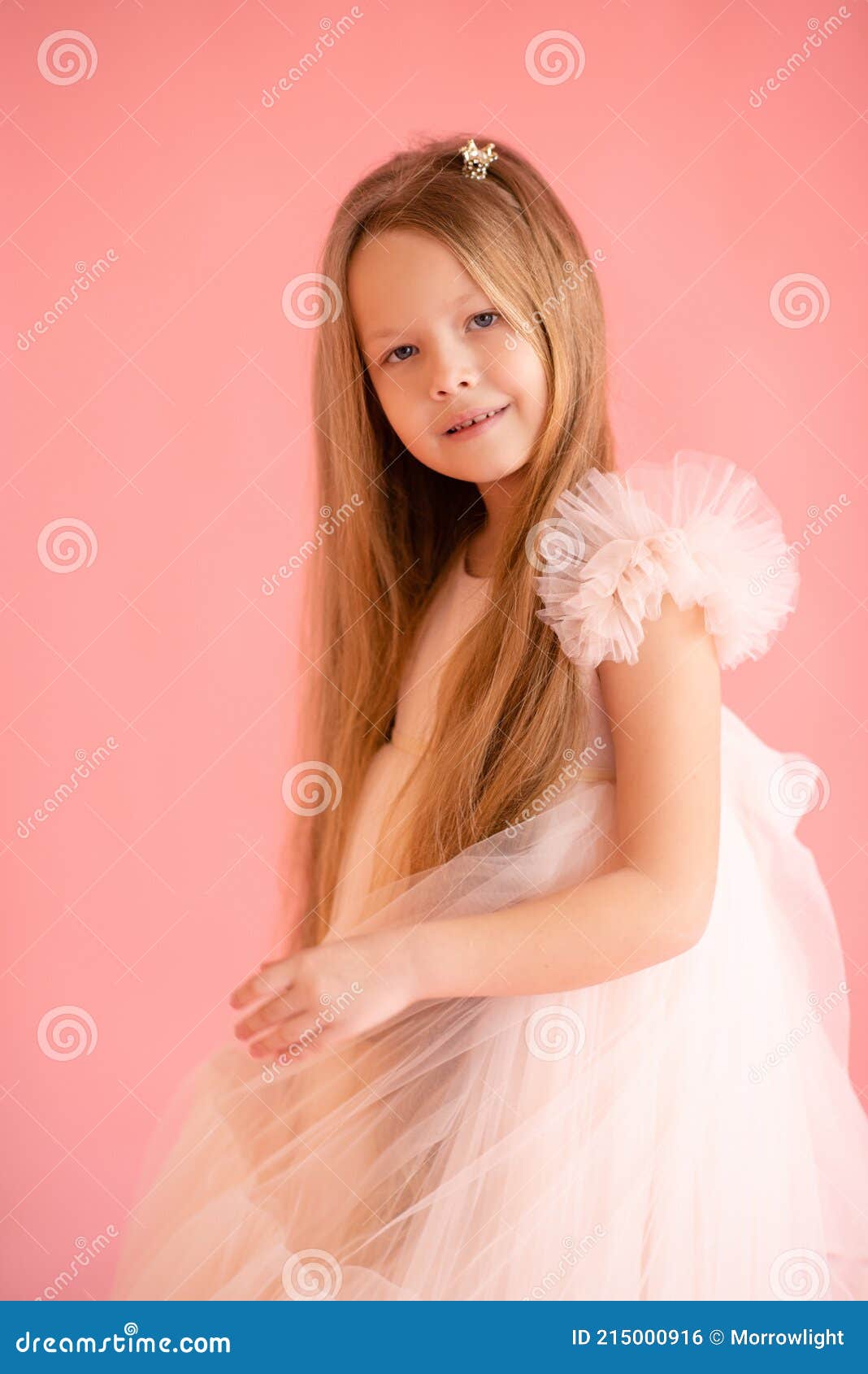 Beautiful Child Girl 7 8 Year Old Wearing Trendy Dress Posing Over Pink