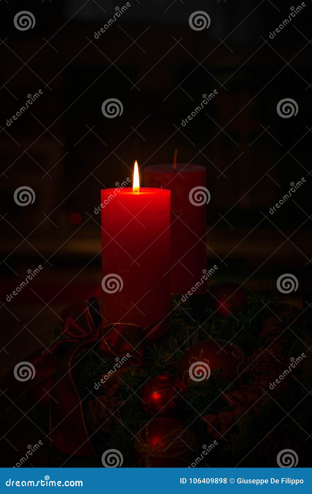Beautiful Christmas Candles Burning in the Darkness 1 Stock Photo