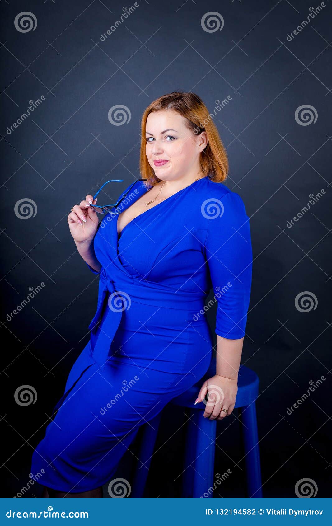 beautiful-chubby-girl-blue-elegant-dress-black-background-beautiful-chubby-girl-blue-elegant-dress-black-132194582.jpg