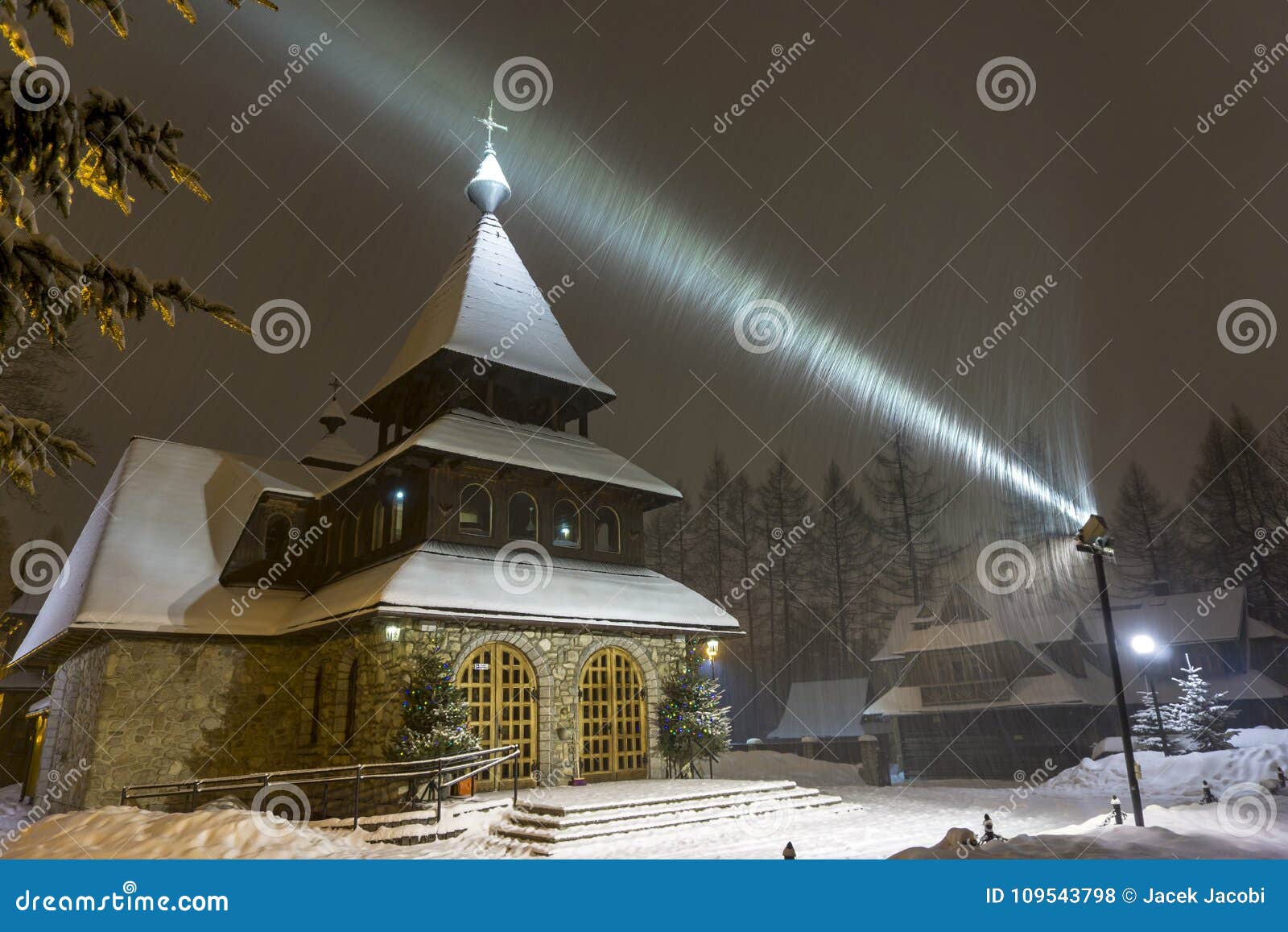 a beautiful church by night in a winter scenery. bystre. zakopane.