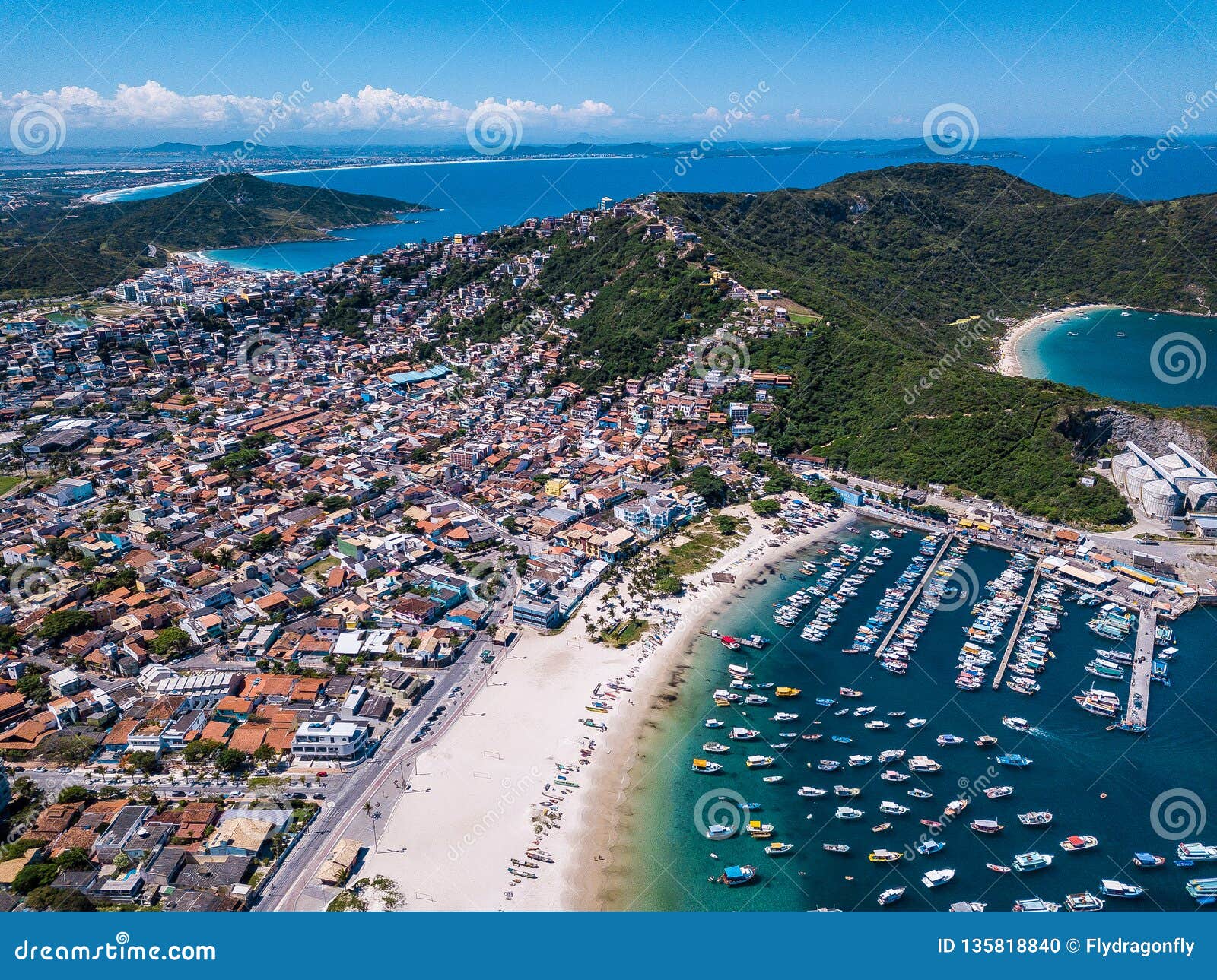 beautiful city arraial do cabo brazil. praia dos anjos. aerial drone photo from above. mountains ocean and fishing boats