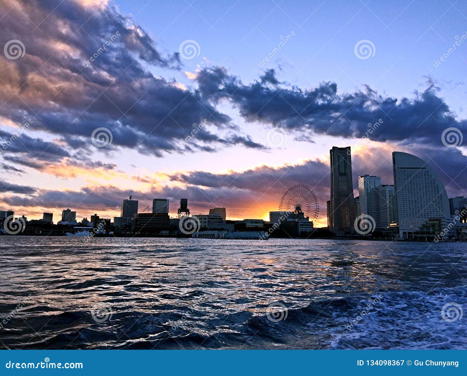 Beautiful city at dusk stock image. Image of seascape - 134098367