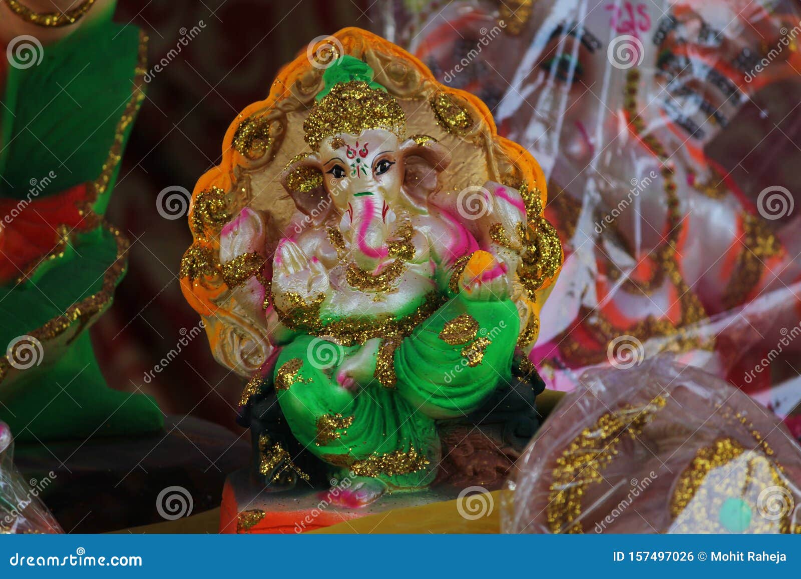 A Beautiful Clay Statue/Idol of an Indian God Lord Ganesha Decorated ...