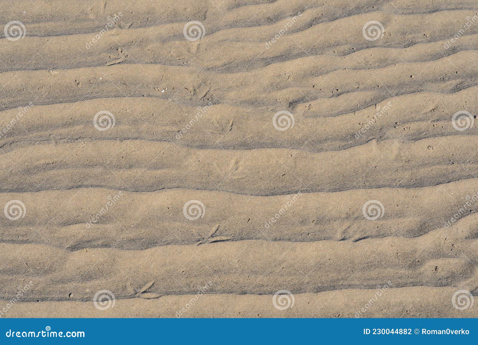 beautiful closeup view of sandy sea bottom patterns at seen sandymount beach, dublin, ireland