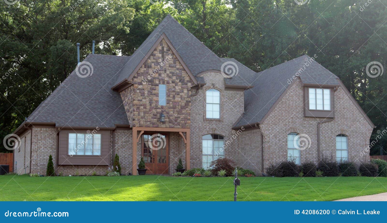 Beautiful Cobblestone And Brown Brick Suburban Home Stock ...