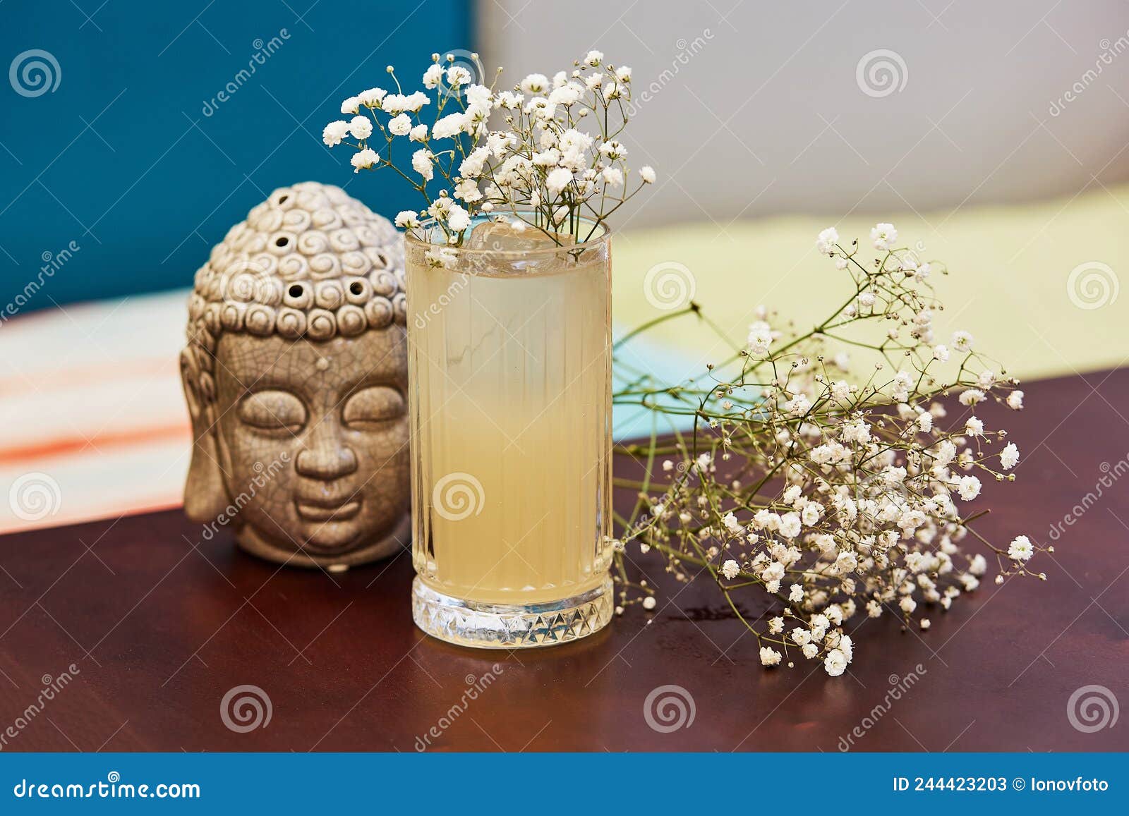 Beautiful Cold Cocktail and Flowers on Table Stock Image - Image of ...