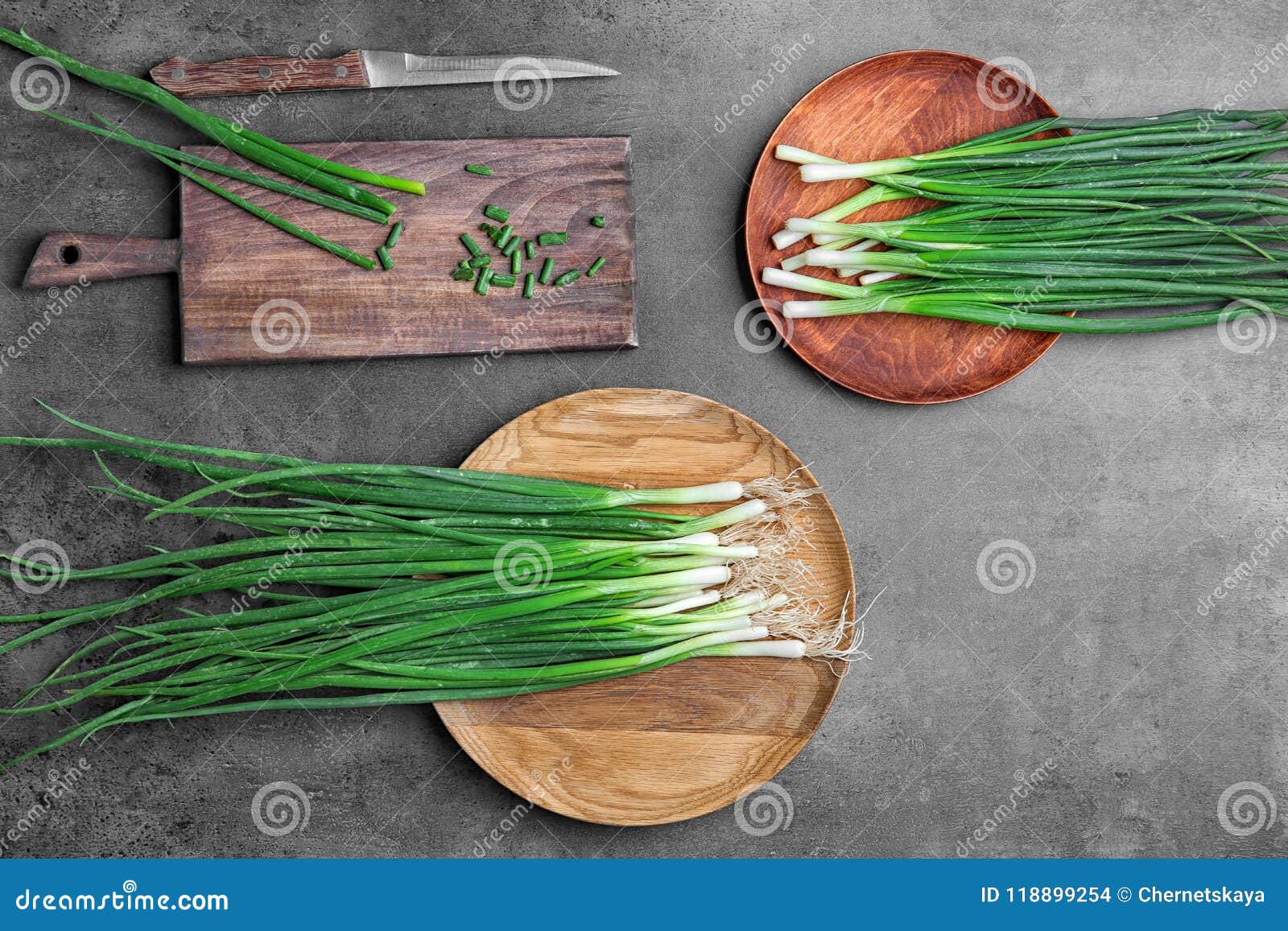 Flat Lay Composition with Fresh Green Onion on Table Stock Photo