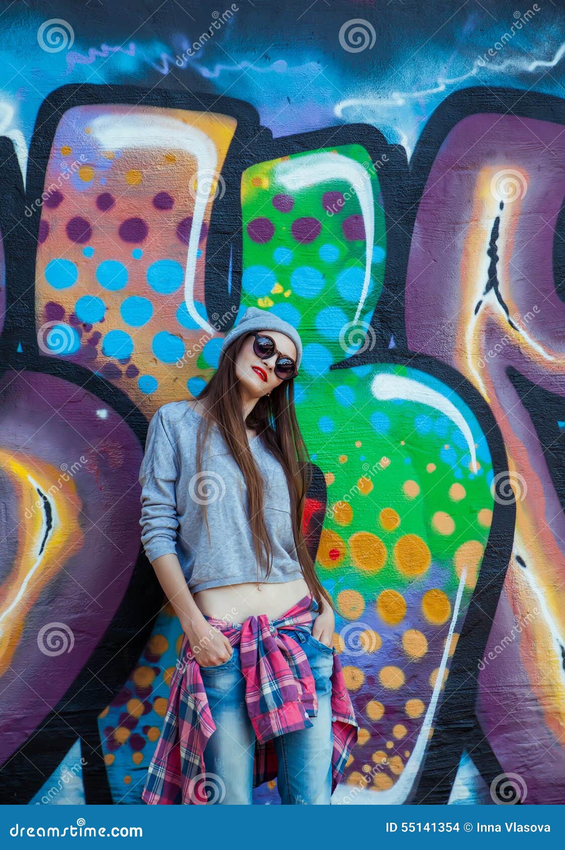 Beautiful Cool Girl in Hat and Sunglasses Over Graffiti Wall Editorial ...