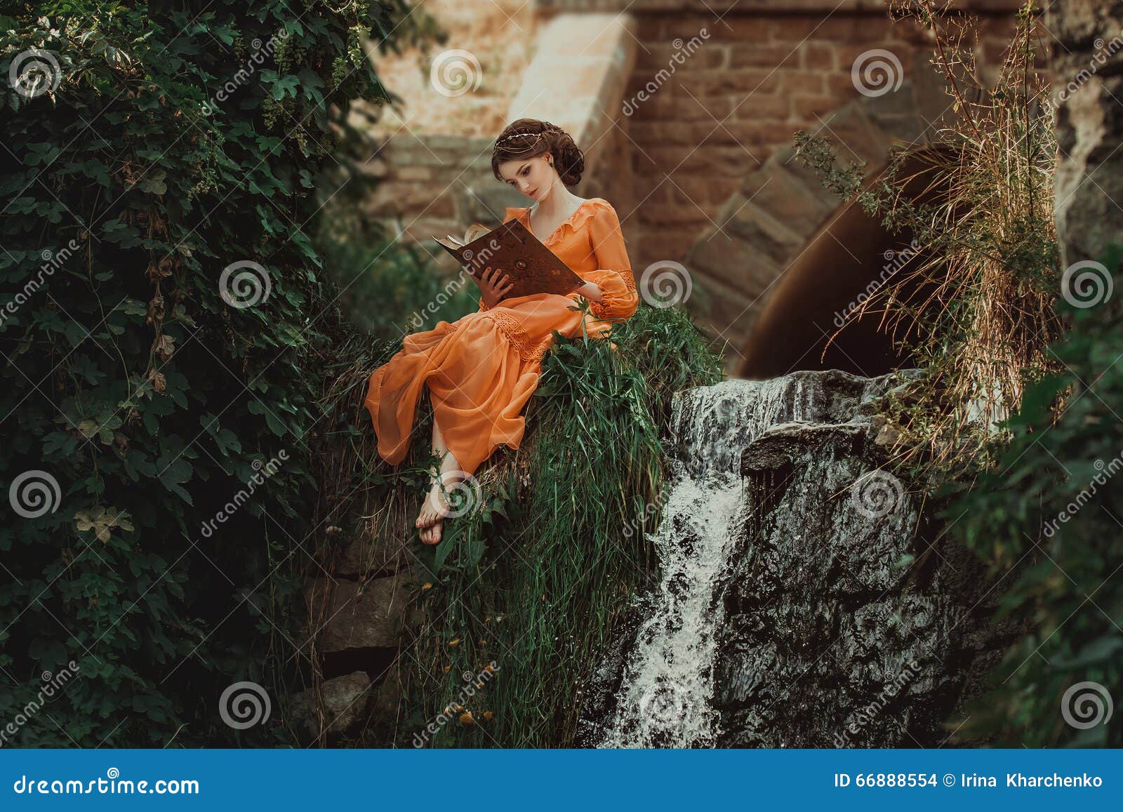 the beautiful countess in a long orange dress