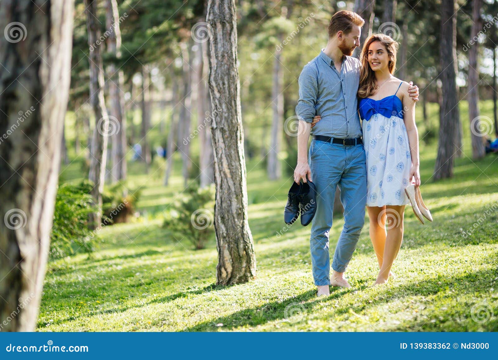 Beautiful Couple in Forest Embracing Love Stock Photo - Image of happy