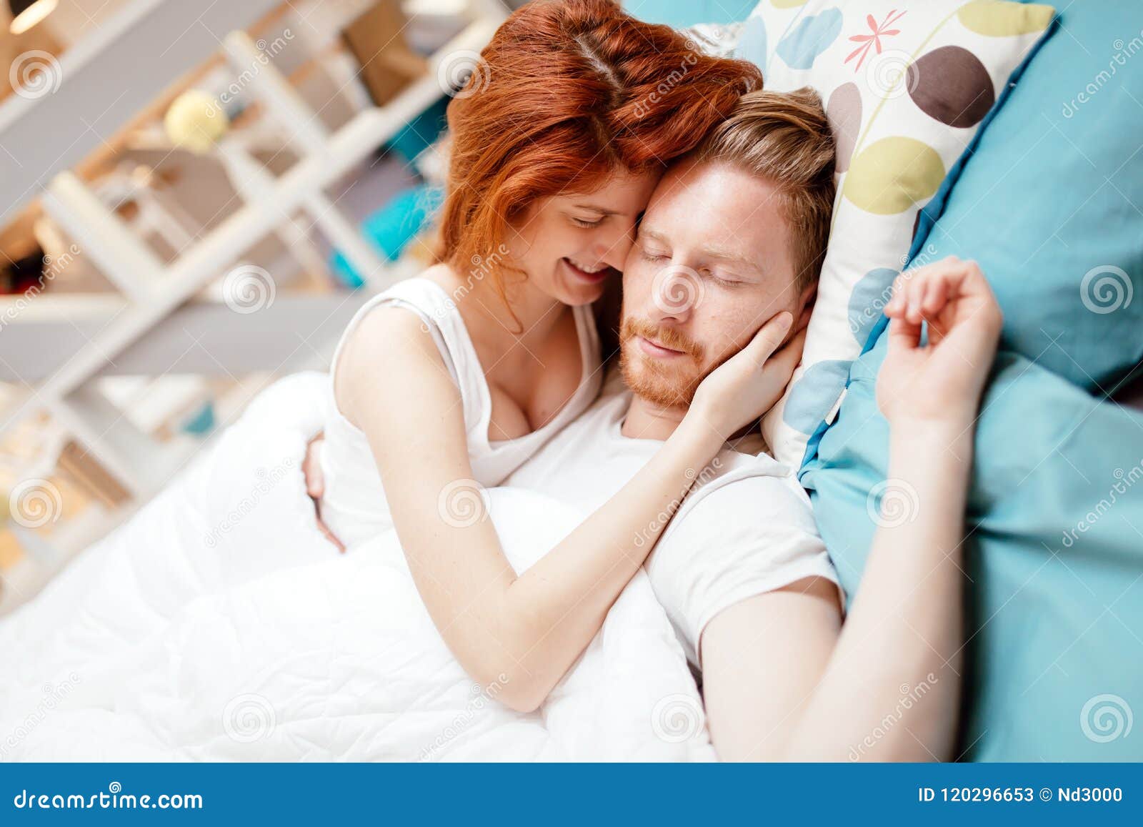 Beautiful Couple Romance in Bed Stock