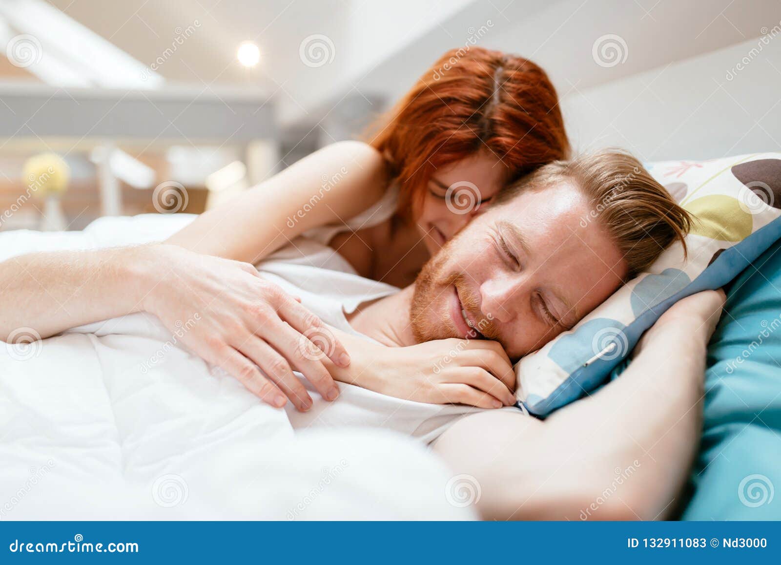 Beautiful Couple Romance in Bed Stock