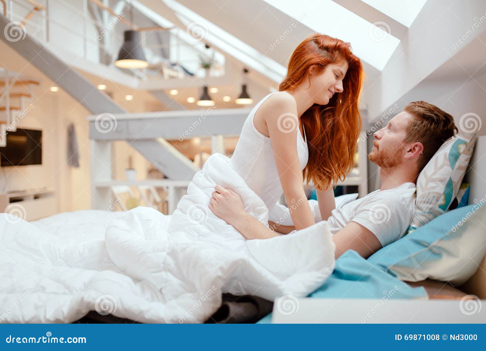 Beautiful Couple Romance in Bed Stock