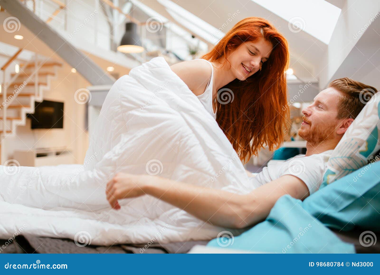 Beautiful Couple Romance in Bed Stock