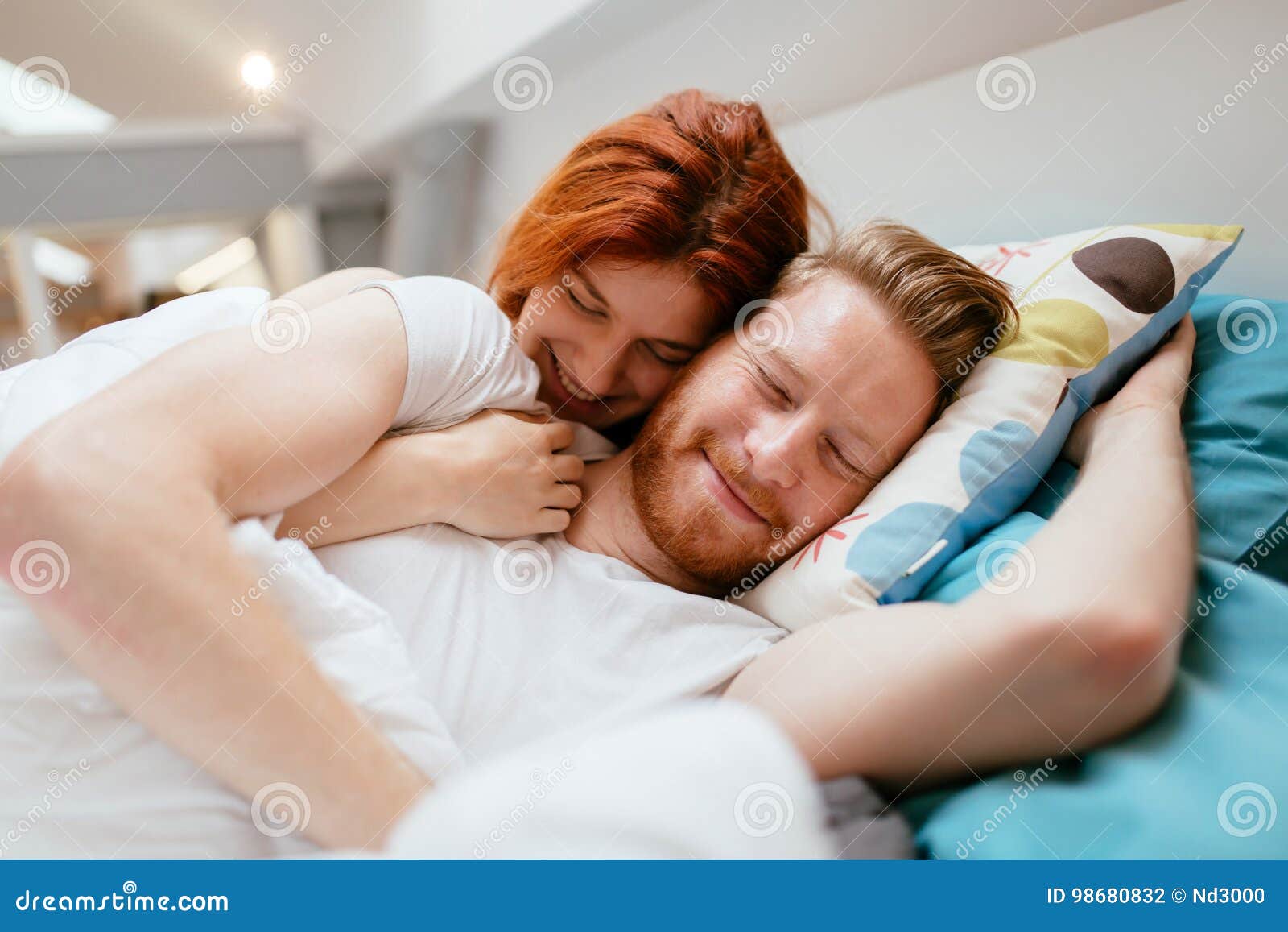 Beautiful Couple Romance in Bed Stock