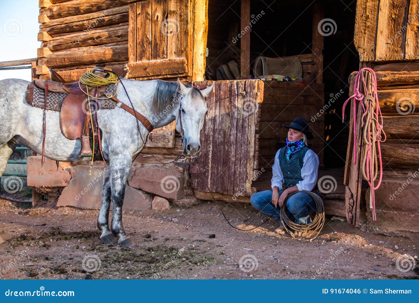 beautiful cowgirl in western scene