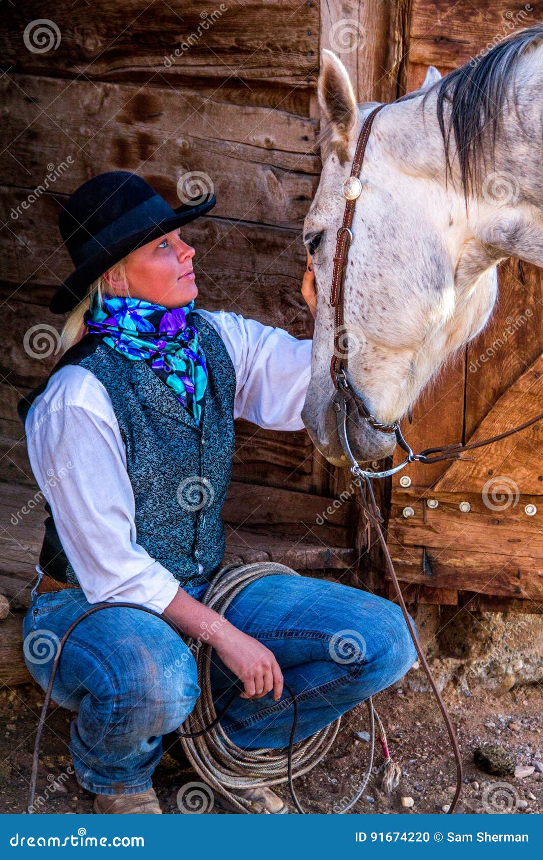 beautiful cowgirl in western scene