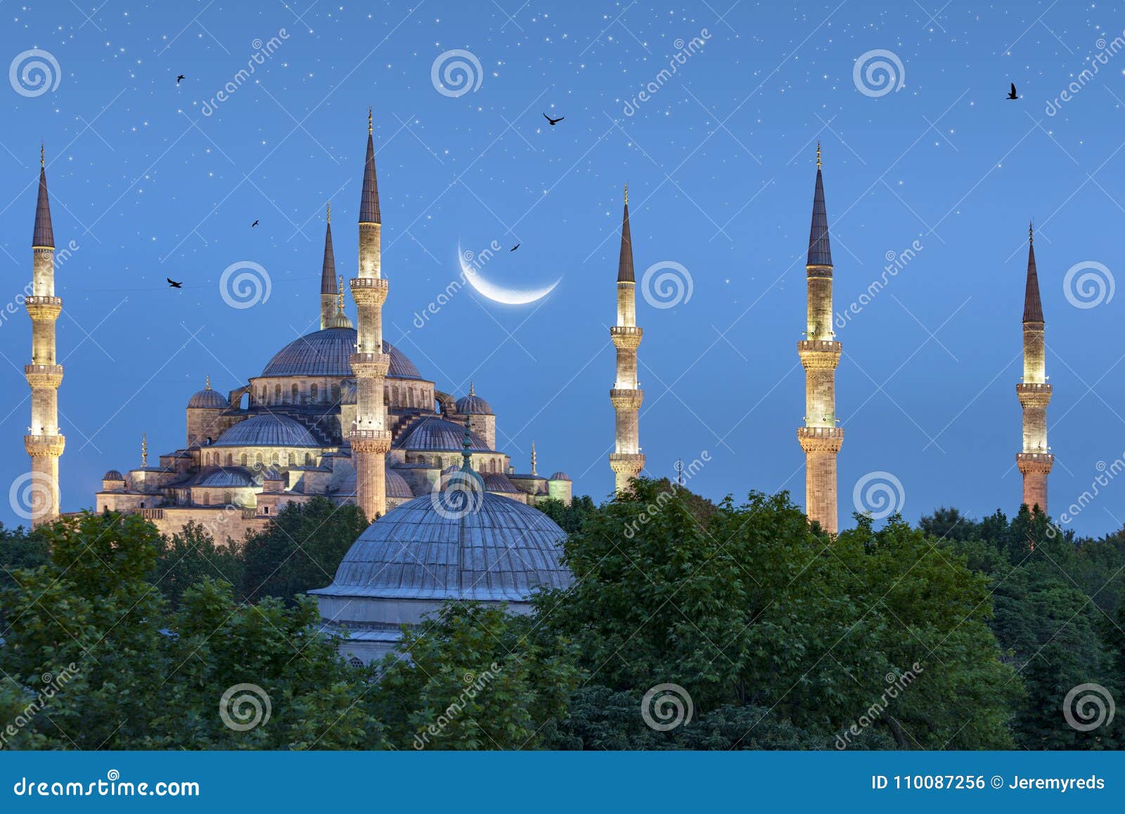 beautiful crescent moon over blue mosque in istanbul, turkey