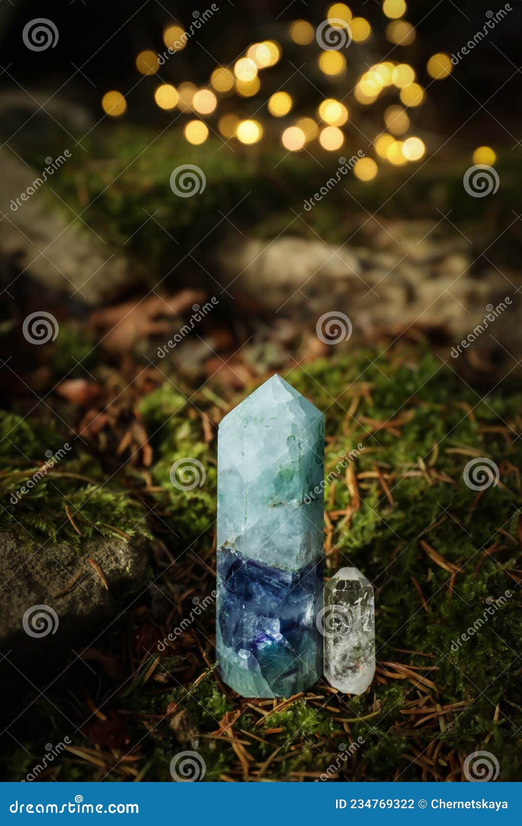Beautiful Crystals on Moss Against Blurred Lights Stock Photo Image