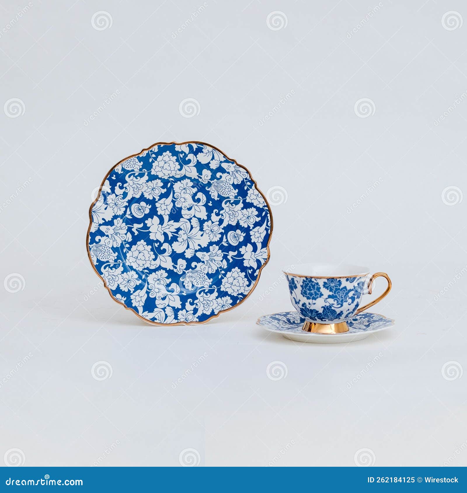 Beautiful Decorative Dish, Coffee Cup and Plate on a White Background