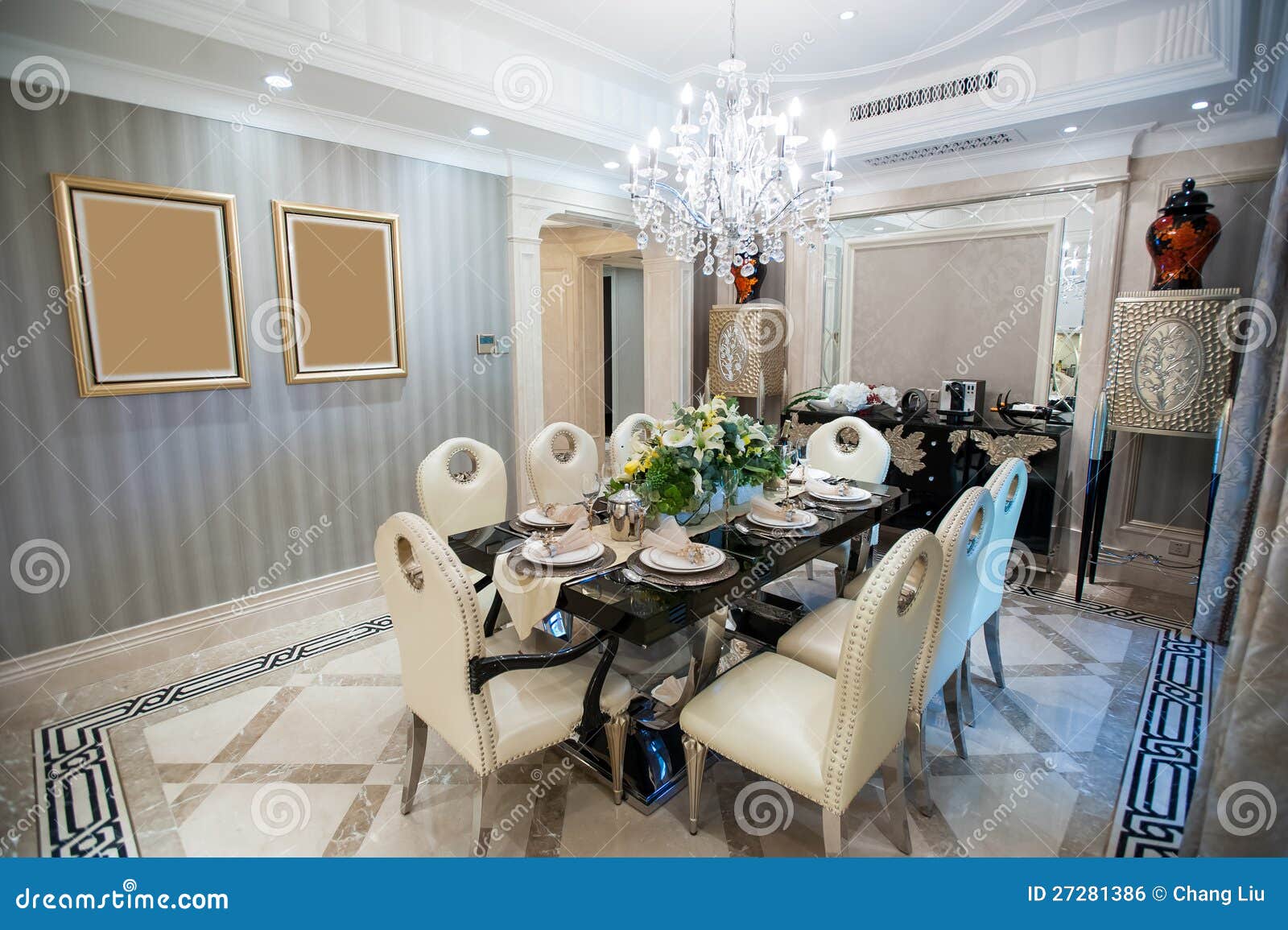 beautiful dining room with chandelier in a mansion