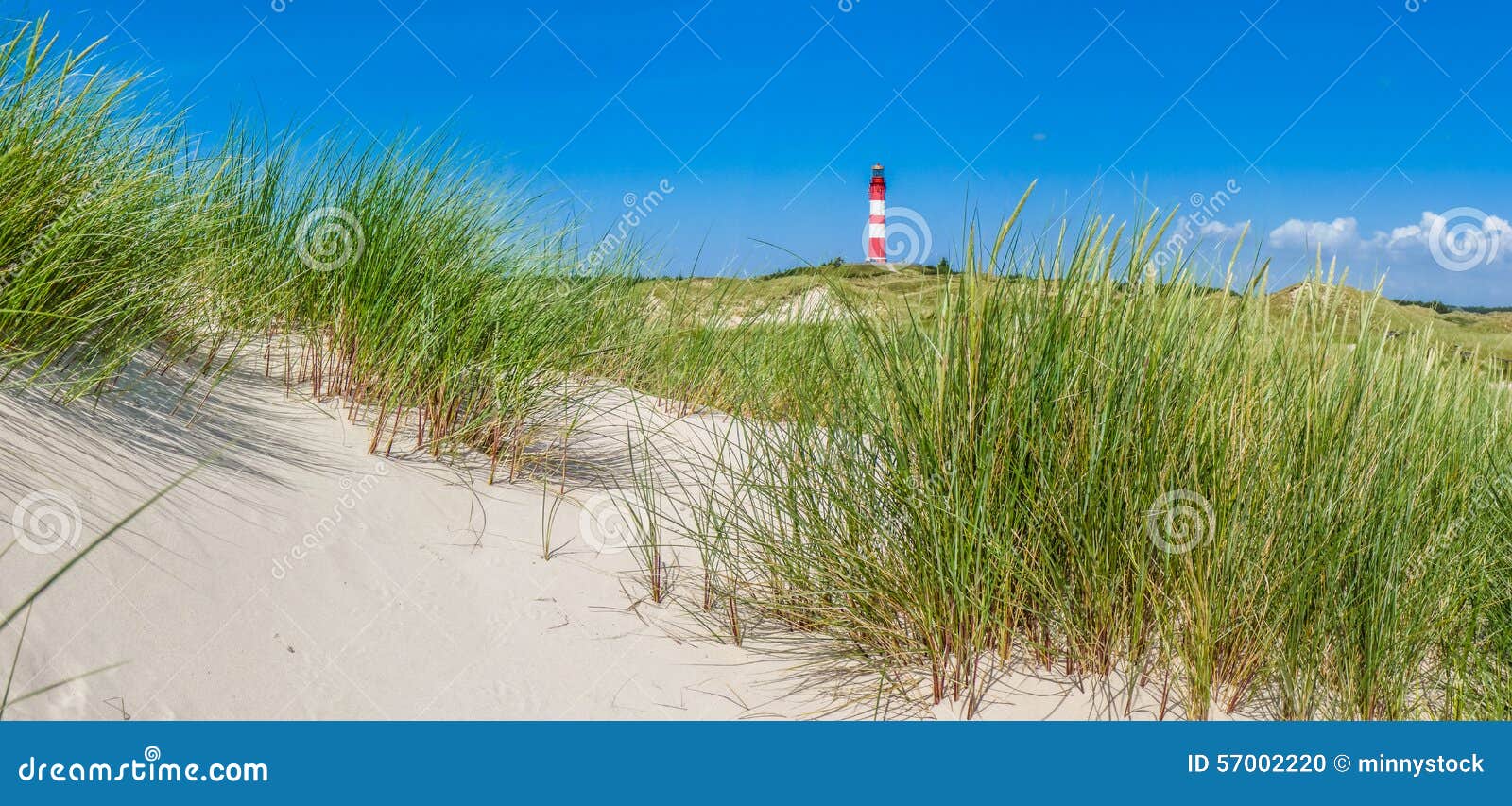 beautiful dune landscape with traditional lighthouse at north sea, schleswig-holstein, north sea, germany