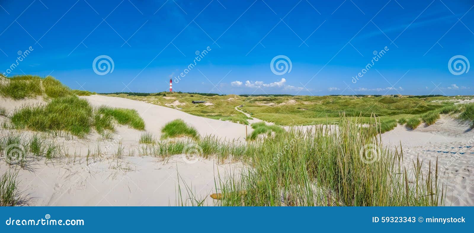 beautiful dune landscape with traditional lighthouse at north sea, schleswig-holstein, north sea, germany