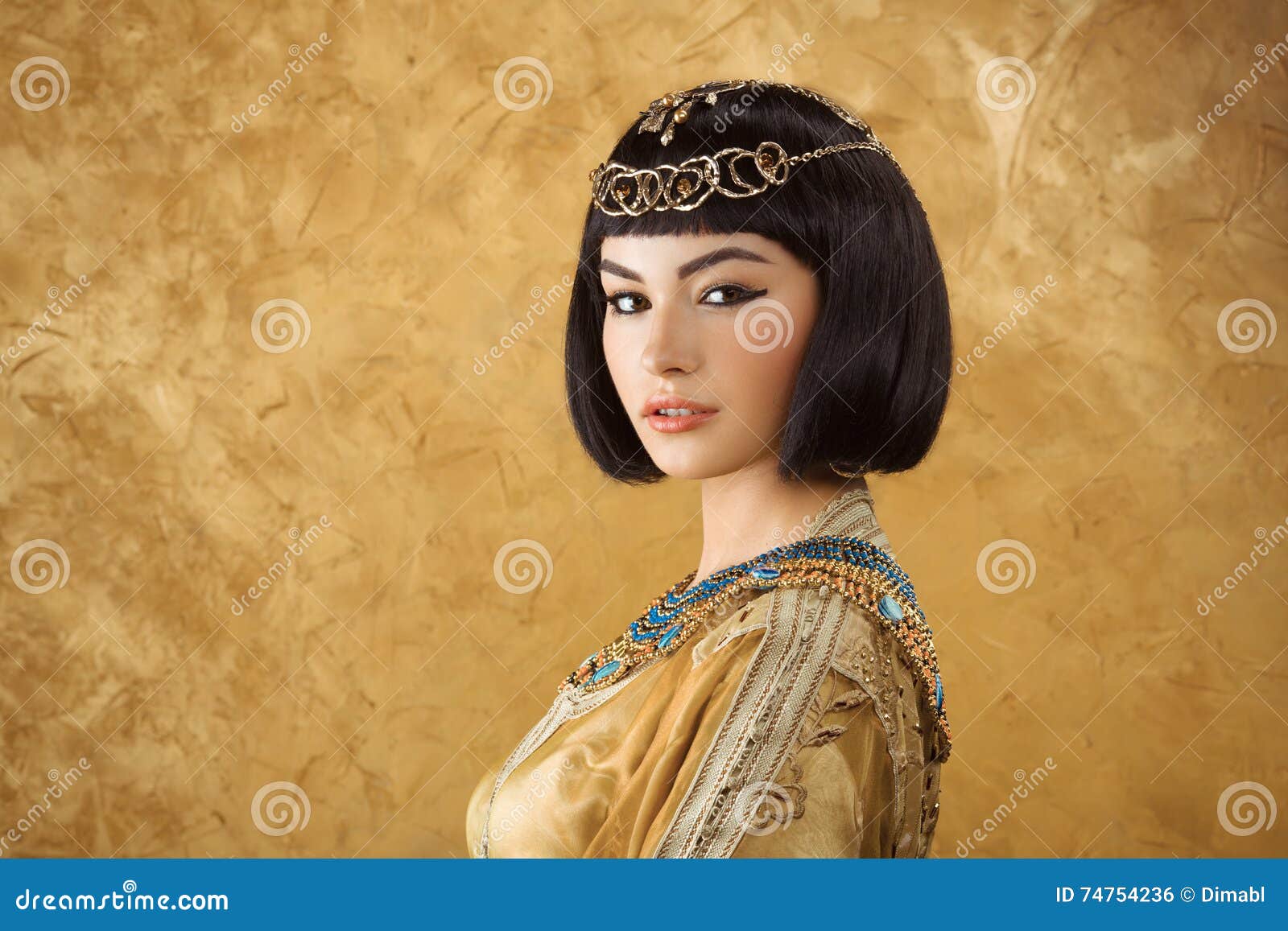 Beautiful Egyptian Woman Like Cleopatra On Golden Background Stock