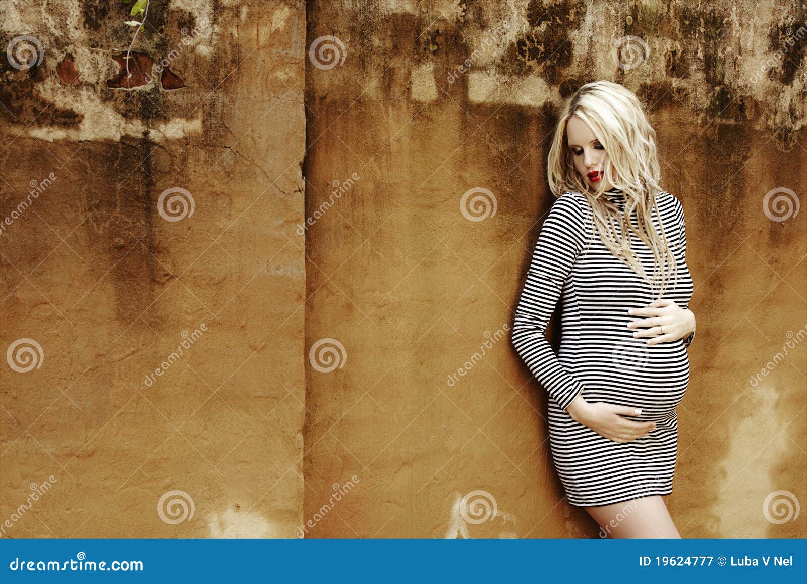 Beautiful Eight Months Pregnant Blond Woman Stock Image