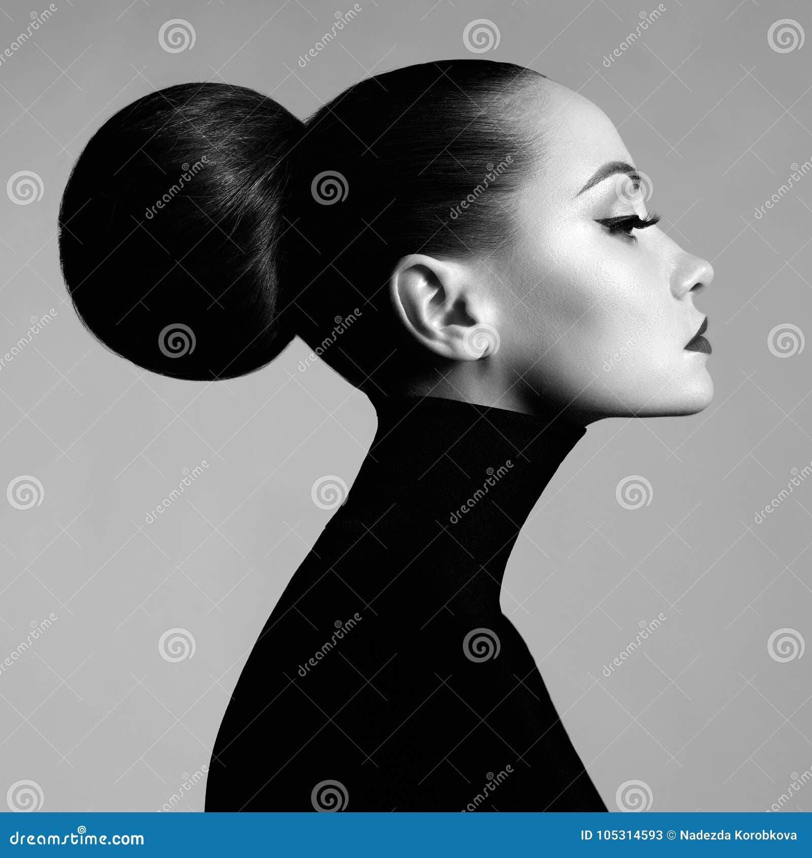 beautiful elegant woman in black turtleneck