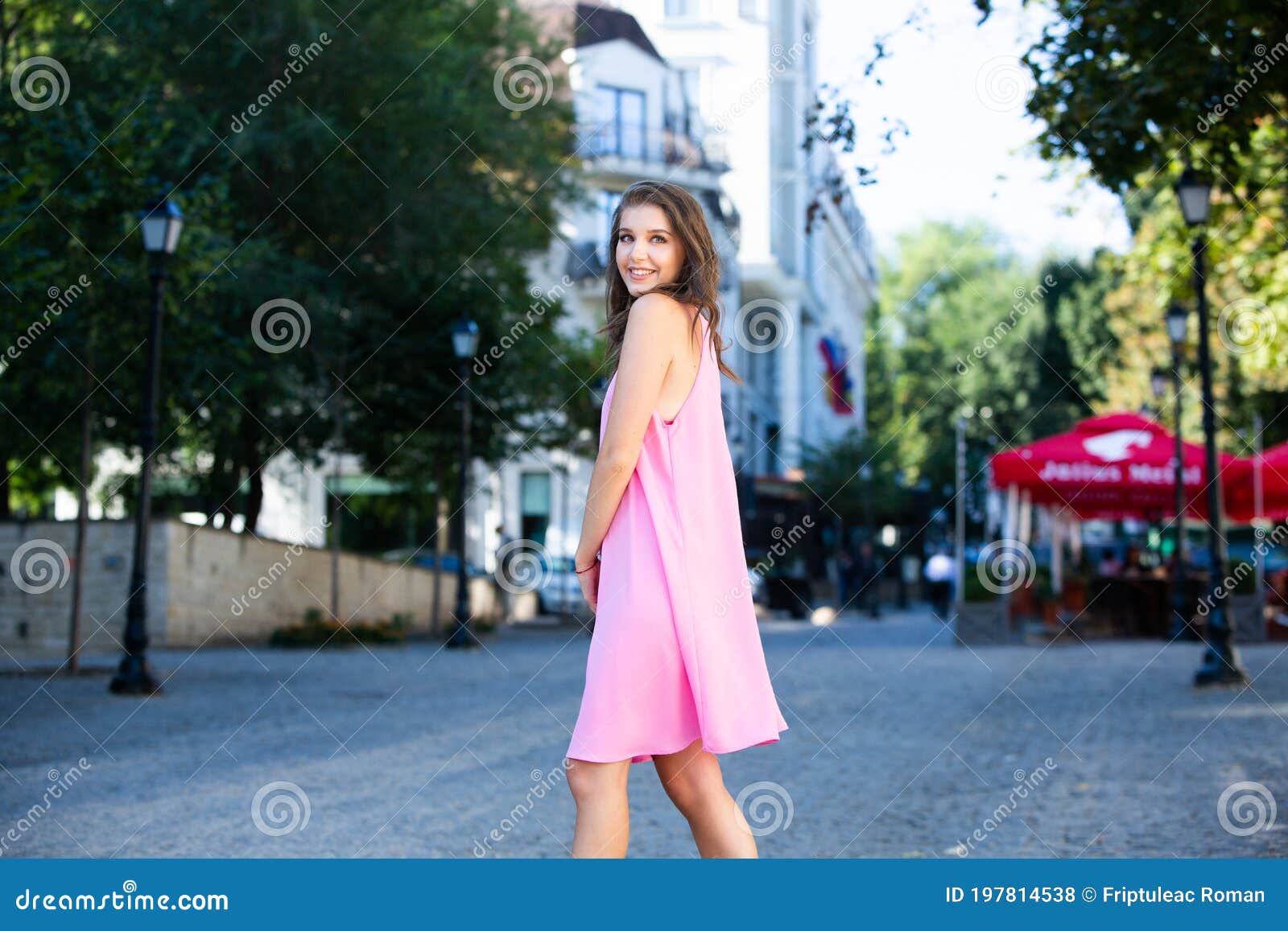 Beautiful European Girl in Summer Dress Walking on the Street Stock ...