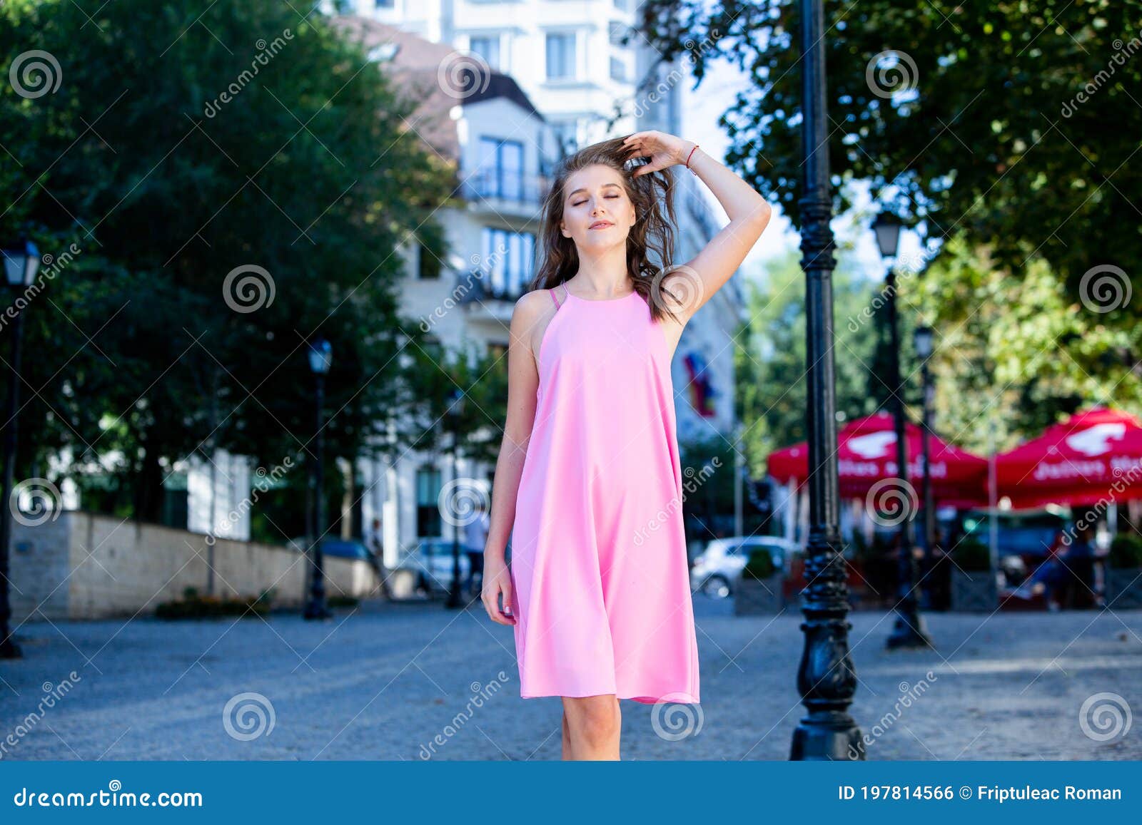 Beautiful European Girl in Summer Dress Walking on the Street Stock ...