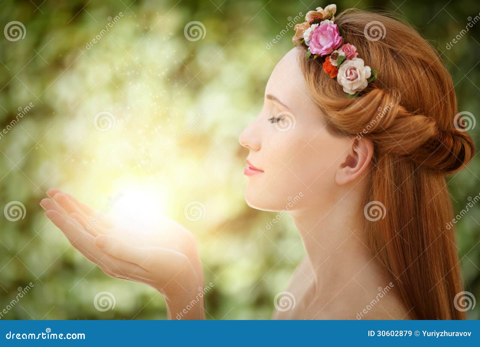 beautiful fairy woman with glow in hands