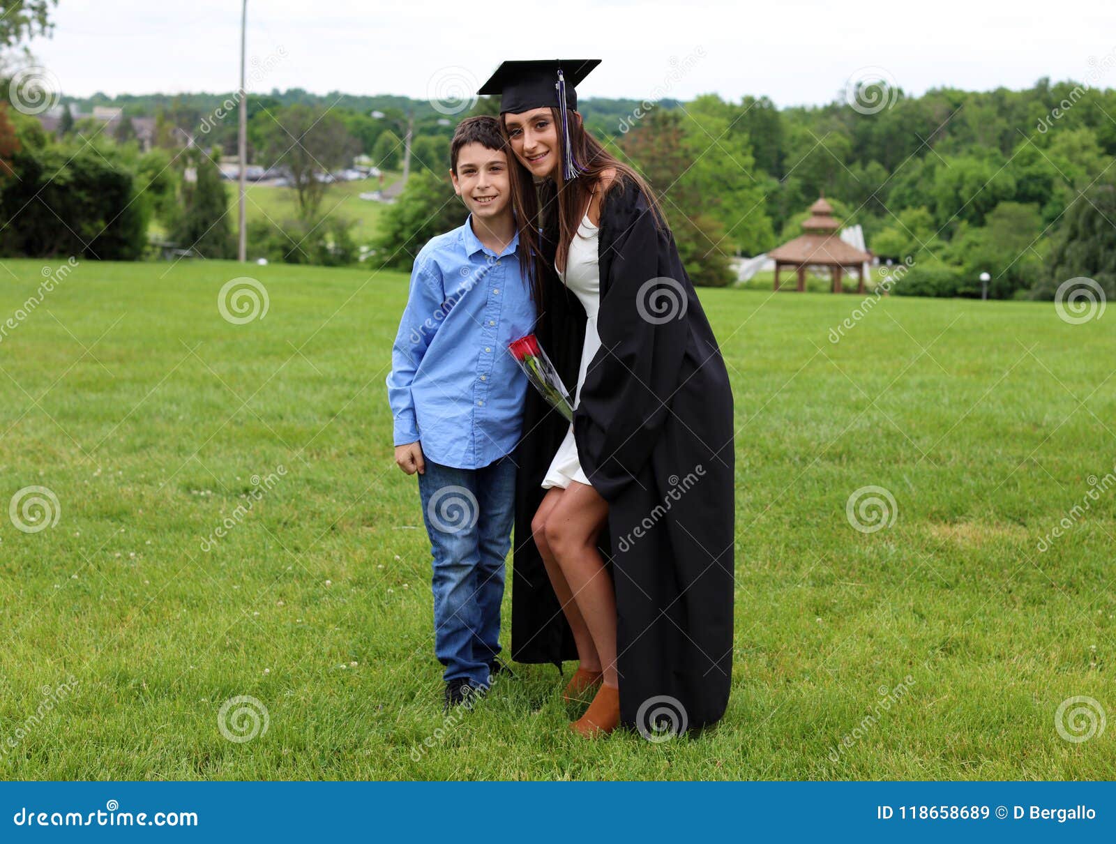 white dress under graduation gown