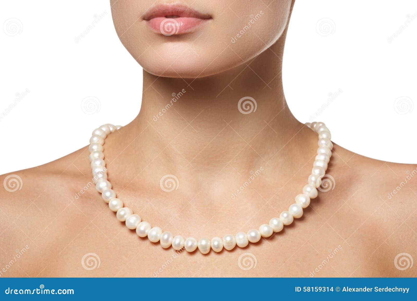 beautiful fashion pearls necklace on the neck. jewellery and bijouterie