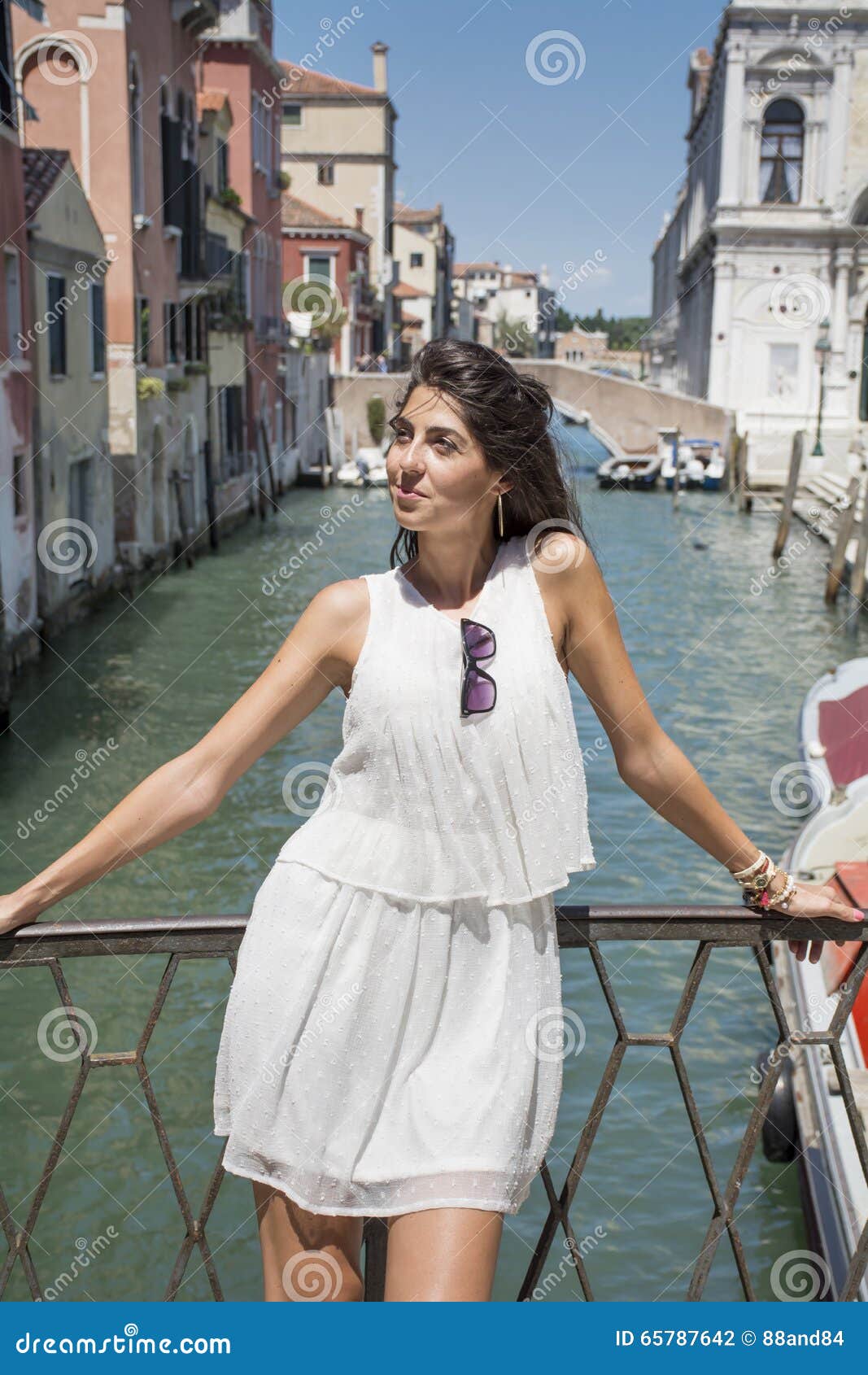 Beautiful Fashion Woman With White Dress In Venice Italy