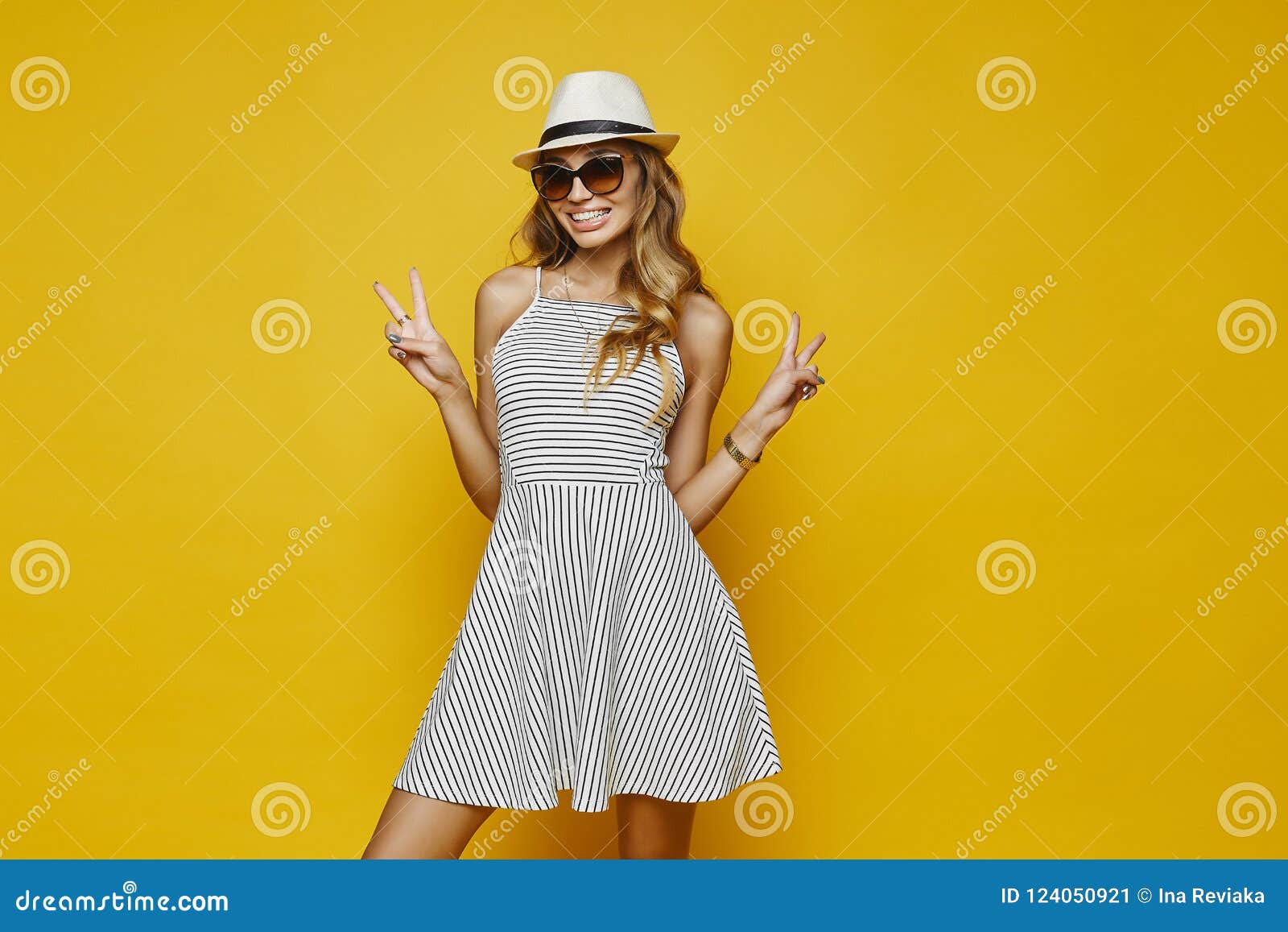 Girl In Transparent Clothes On A Striped Background. Stock Photo, Picture  and Royalty Free Image. Image 140114539.