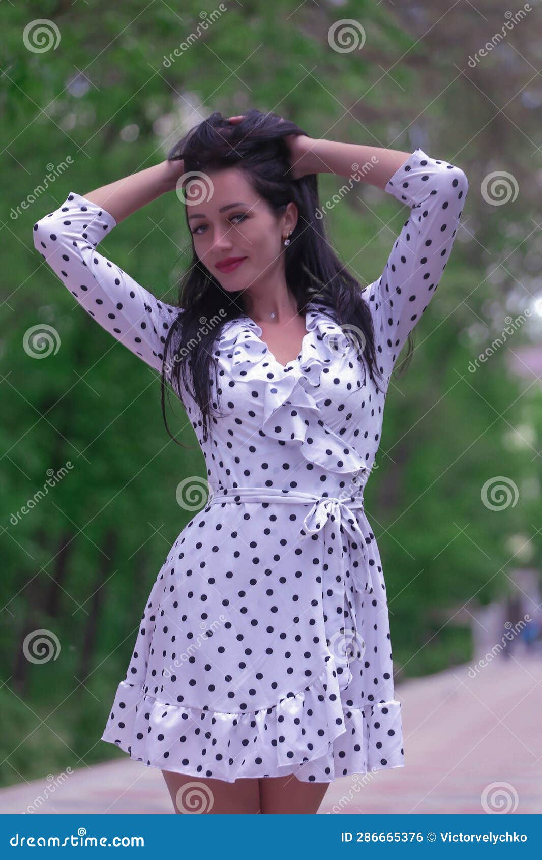 Beautiful Fashionable Brunette Woman Adult Posing In The Park On The