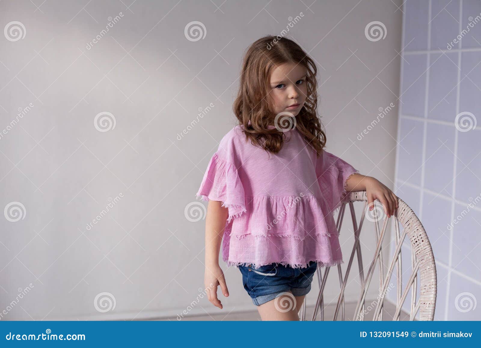 Beautiful Fashionable Little Girl Sits in a Chair Stock Image - Image ...