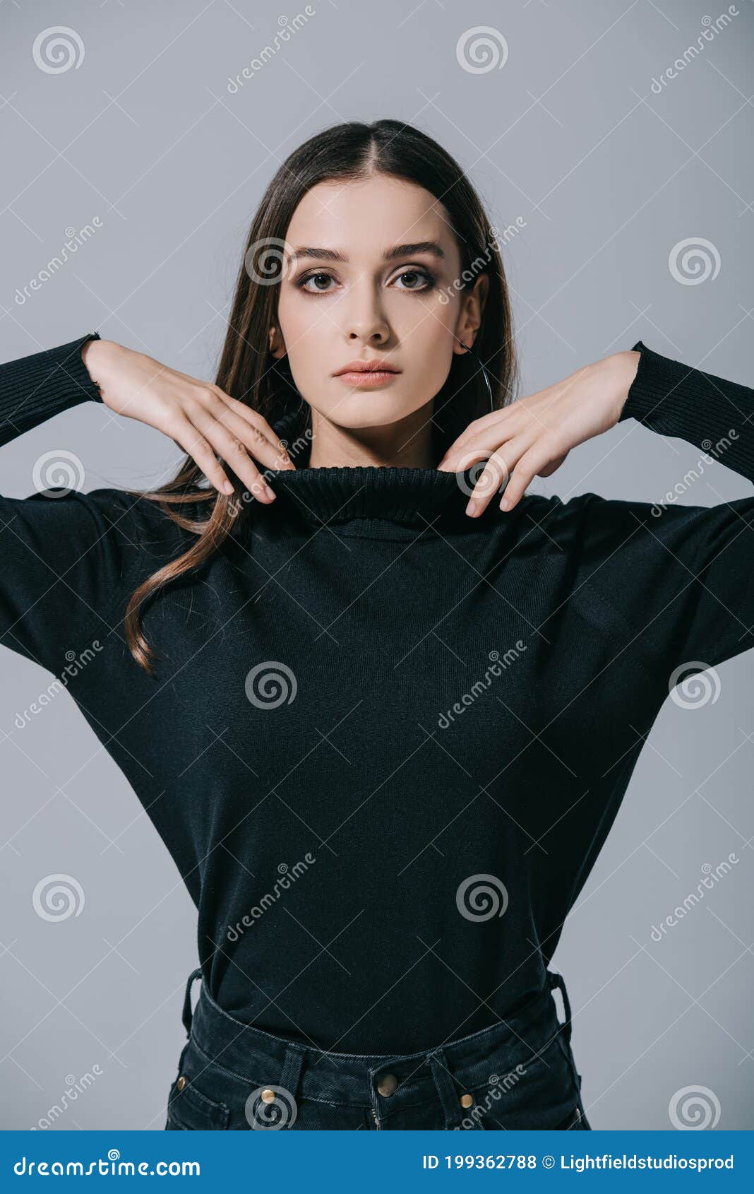 Fashionable Woman Posing in Black Sweater, Isolated on Grey Stock Photo ...