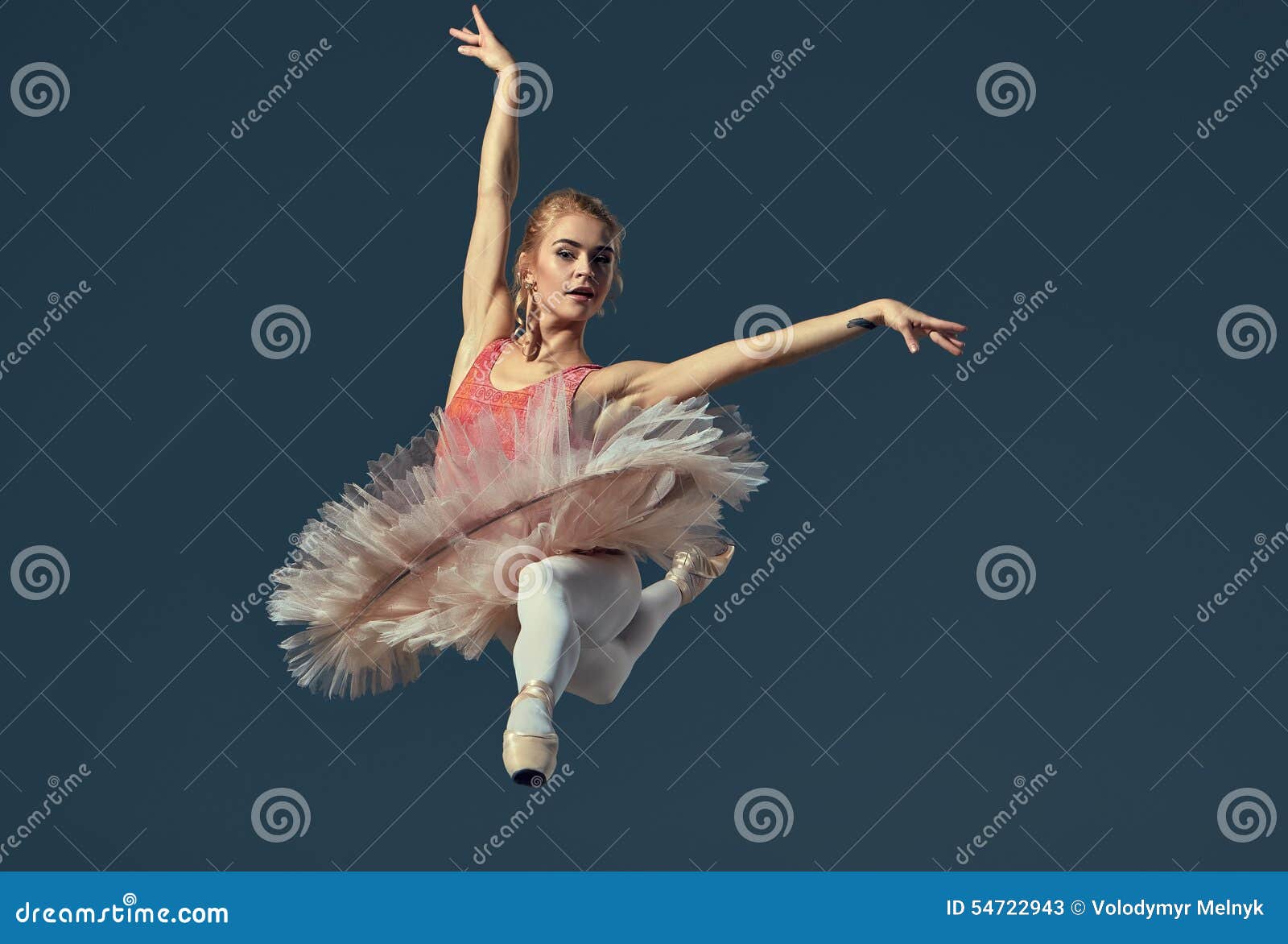 Beautiful Female Ballet Dancer on a Grey Stock Image - Image of jumping ...