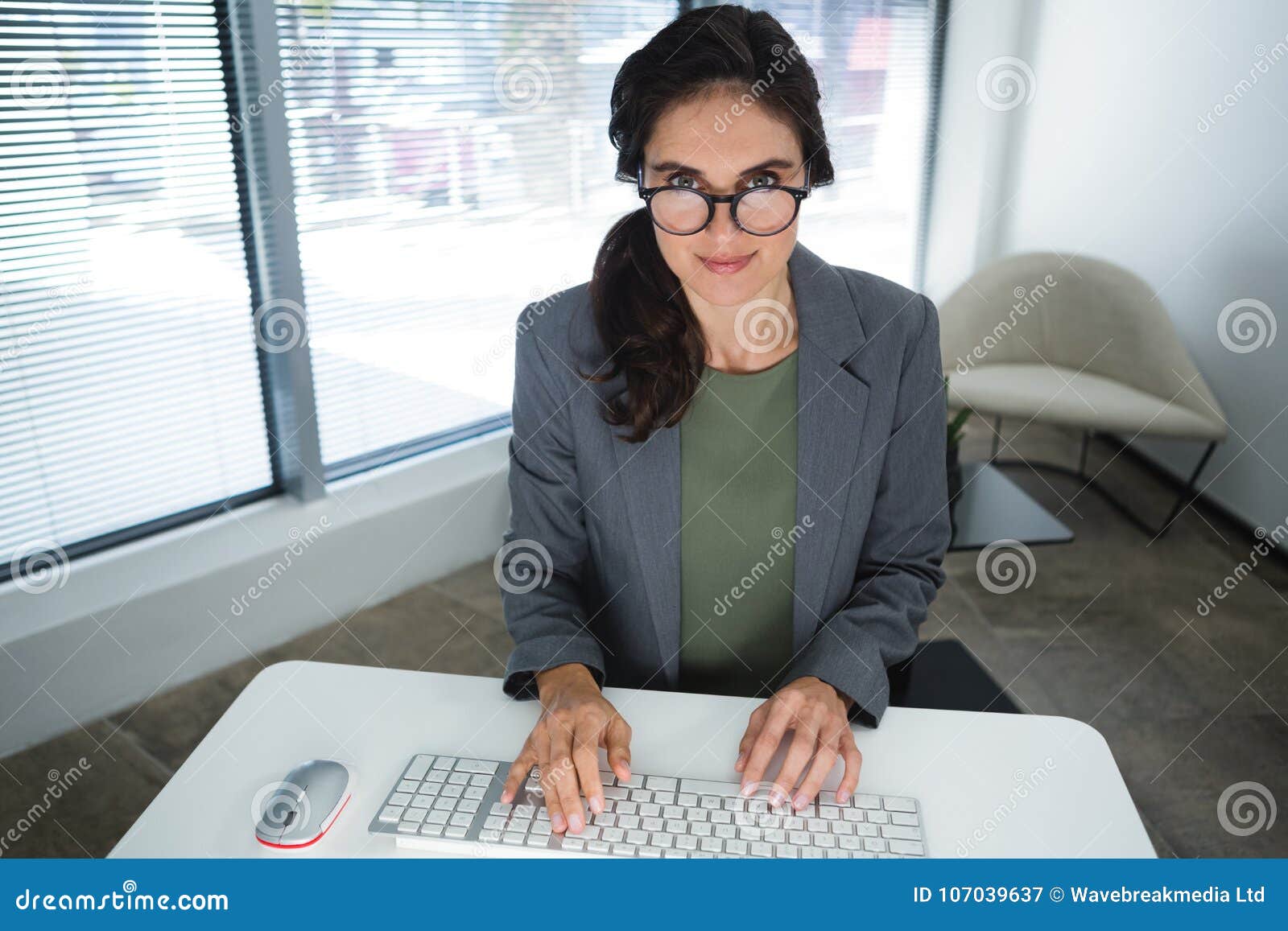 Beautiful Female Executive Working at Desk Stock Image Image of