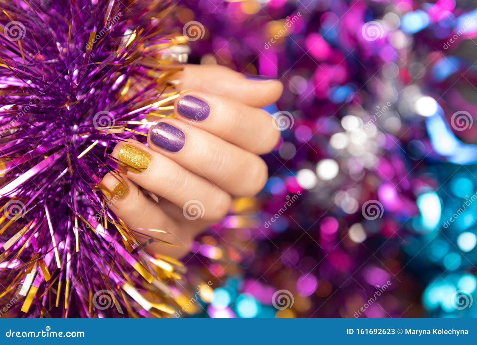 Beautiful Female Hand with Purple Christmas Nail Design Stock Image ...