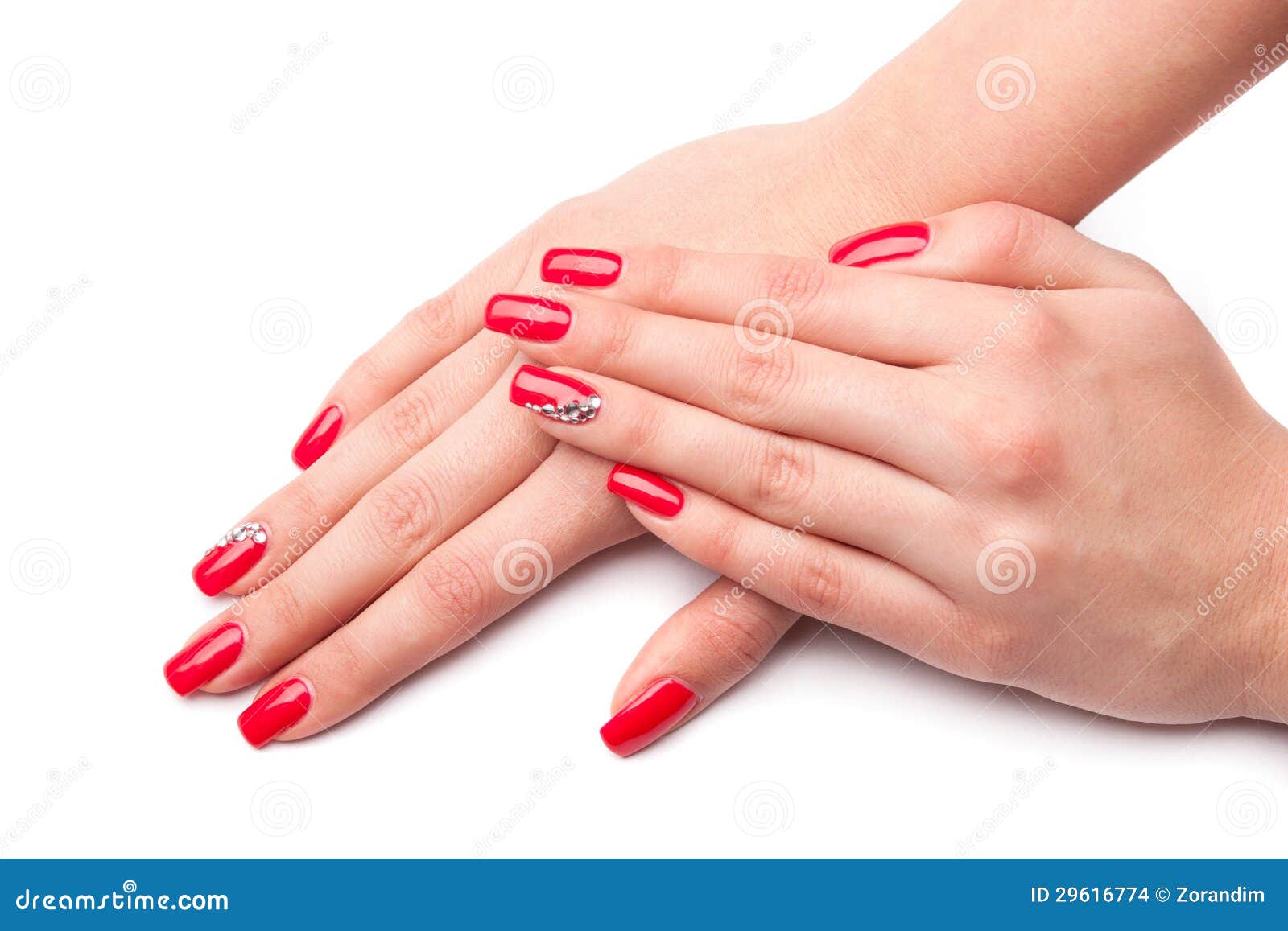 Womans Hand with Red Nails · Free Stock Photo