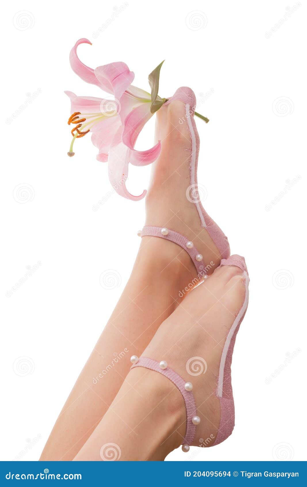 Beautiful Female Legs In Fashionable Socks With A Flower